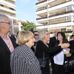 Murielle Roustan et ses enfants Charlotte et Dimitri - Sorties des obsèques du journaliste sportif, Didier Roustan, décédé le 11 septembre à l'âge de 66 ans en l'église Notre-Dame-des-Pins, à Cannes le 20 septembre 2024. © Franz Chavaroche/Bestimage