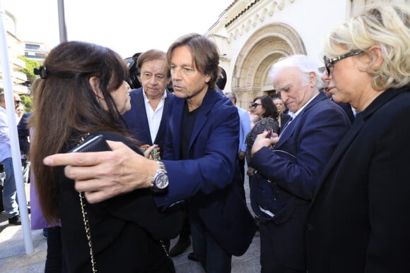 Murielle Roustan, Daniel Lauclair, Daniel Bravo - Sorties des obsèques du journaliste sportif, Didier Roustan, décédé le 11 septembre à l'âge de 66 ans en l'église Notre-Dame-des-Pins, à Cannes le 20 septembre 2024. © Franz Chavaroche/Bestimage