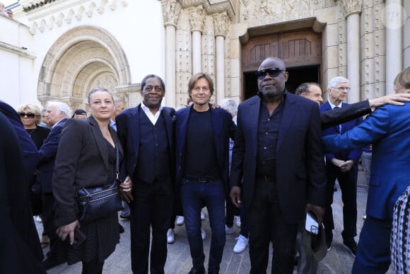 Daniel Bravo, Basile Boli - Sorties des obsèques du journaliste sportif, Didier Roustan, décédé le 11 septembre à l'âge de 66 ans en l'église Notre-Dame-des-Pins, à Cannes le 20 septembre 2024. © Franz Chavaroche/Bestimage