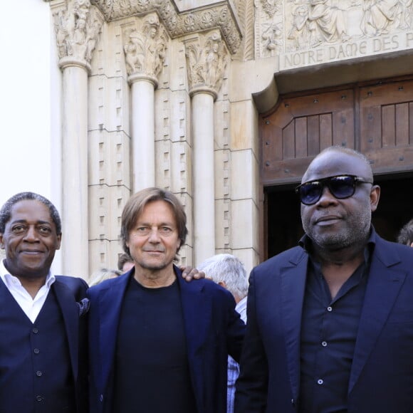 Daniel Bravo, Basile Boli - Sorties des obsèques du journaliste sportif, Didier Roustan, décédé le 11 septembre à l'âge de 66 ans en l'église Notre-Dame-des-Pins, à Cannes le 20 septembre 2024. © Franz Chavaroche/Bestimage