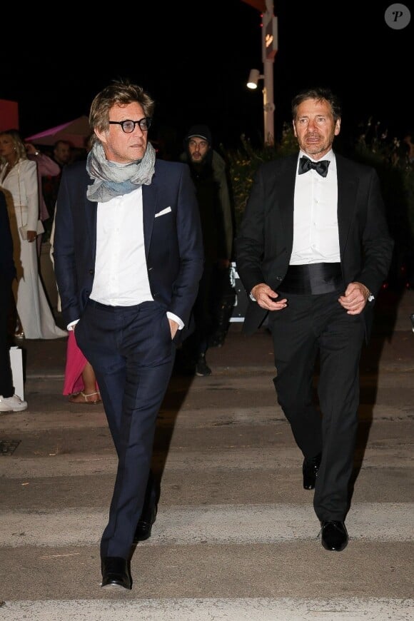 Cannes, FRANCE - French Journalist Laurent Delahousse, looking dapper in a sleek suit, was seen mingling with guests after the Magnum event on the Croisette in Cannes. Pictured: Laurent Delahousse