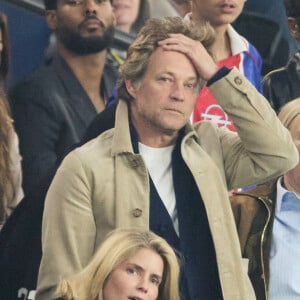 Alice Taglioni et son compagnon Laurent Delahousse - Célébrités dans les tribunes de la demi-finale retour de Ligue des champions entre le PSG face au Borussia Dortmund (0-1) au Parc des Princes à Paris le 7 mai 2024. © Cyril Moreau/Bestimage