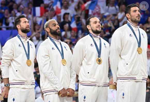 Kevin Tillie and Earvin Ngapeth with gold medal and Antoine Brizard and Nicolas Le Goff (france) , volleyball, men’s finall during the Olympic Games Paris 2024 © Frédéric Chambert / Panoramic / Bestimage