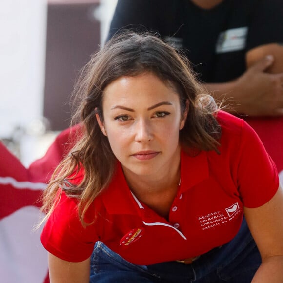 Exclusif - Dounia Coesens - Pétanque du coeur dans le cadre le la 20ème édition de "l'étape du coeur" de l'association "Mécénat Chirurgie Cardiaque" (MCC) lors du tour de France 2023 au Fan Club de Bordeaux, France, le 06 juillet 2023. © Christophe Clovis / Bestimage 