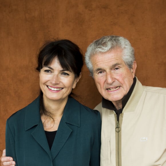 Claude Lelouch et sa femme Valérie Perrin au village des internationaux de France de tennis de Roland Garros 2019 à Paris le 7 juin 2019. © JB Autissier / Panoramic / Bestimage