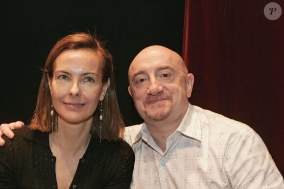 Les acteurs français Carole Bouquet et Michel Blanc assistent à un spectacle spécial pour le 250e anniversaire du génie Wolfgang Amadeus Mozart enregistré par Radio Classique au théâtre Olympia à Paris, France, le 27 janvier 2006.