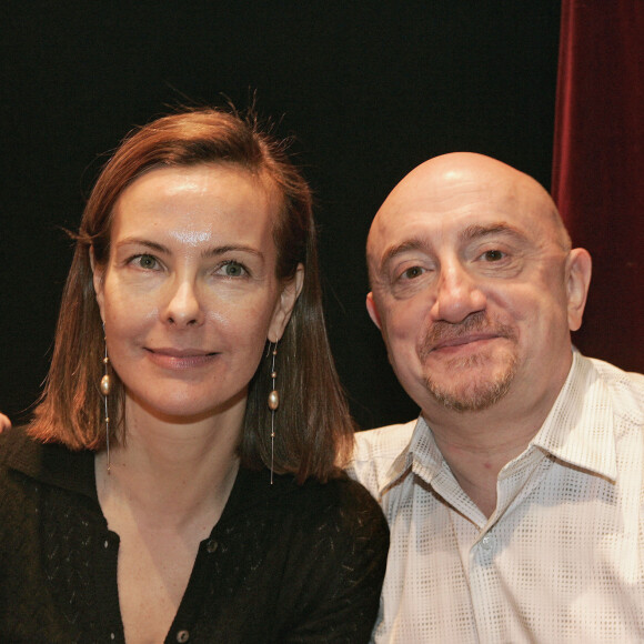 Les acteurs français Carole Bouquet et Michel Blanc assistent à un spectacle spécial pour le 250e anniversaire du génie Wolfgang Amadeus Mozart enregistré par Radio Classique au théâtre Olympia à Paris, France, le 27 janvier 2006.