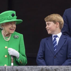  "j'ai décidé, parce que ma femme faisait de la chimiothérapie, que je ne voulais pas risquer de ramener du Covid à la maison"
La reine Elisabeth II d'Angleterre, Le prince George de Cambridge - Jubilé de platine de la reine Elisabeth II d'Angleterre à Bukingham Palace à Londres, le 5 juin 2022. 