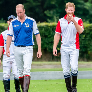 Le prince William, duc de Cambridge et son frère le prince Harry, duc de Sussex lors d'un match de polo de bienfaisance King Power Royal Charity Polo Day à Wokinghan, comté de Berkshire, Royaume Uni, le 10 juillet 2019. 