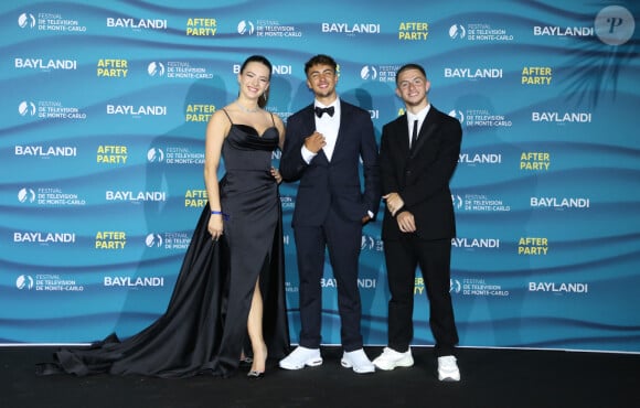 Michou, Elsa Bois et Inoxtag au photocall de l'after party de la cérémonie d'ouverture de la 61ème édition du Festival de Télévision de Monte-Carlo au Monte Carlo Beach, à Monaco, le 17 juin 2022. © Denis Guignebourg/BestImage