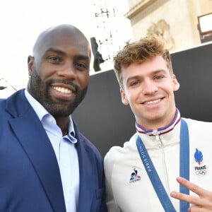 Exclusif - Teddy Riner, Léon Marchand - Remise des médailles par le président de la République à l'Arc de Triomphe aux athlètes lors de la parade des champions à l'occasion des Jeux Olympiques et Paralympiques Paris 2024, sur l'avenue des Champs-Elysées à Paris. Le 14 septembre 2024 © Perusseau-Ramsamy / Bestimage 