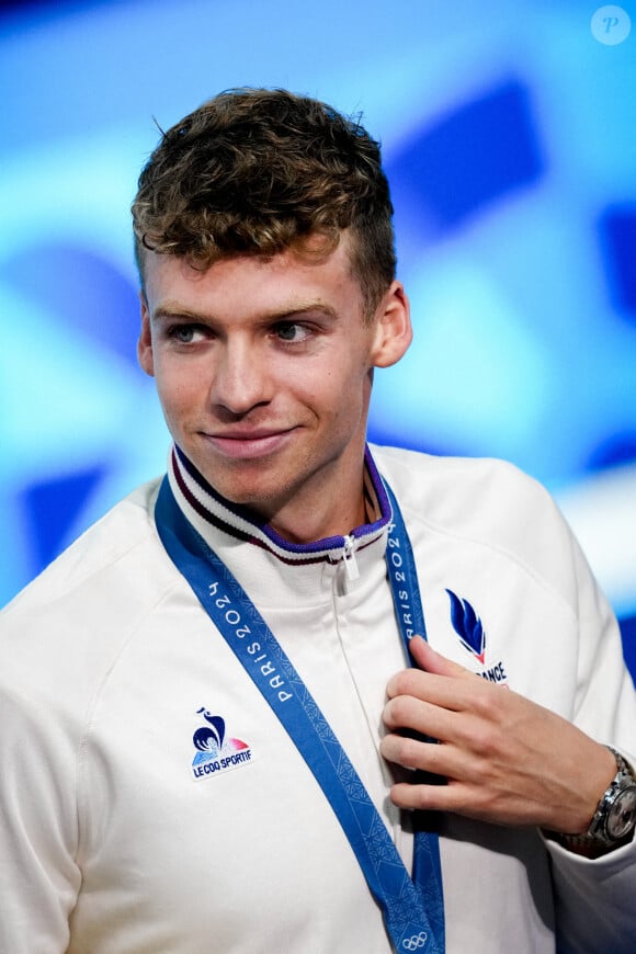 Désormais, les marques se l'arrachent toutes !
Leon Marchand de l'équipe de France célèbre la médaille de bronze de la finale du relais 4x100m quatre nages masculin lors des Jeux Olympiques Paris 2024, à Paris La Défense Arena, à Paris, France, le 04 août 2024. Photo par Julien Poupart/ABACAPRESS.COM