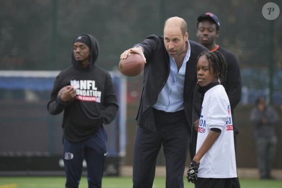 A rappeler que l'organisme oeuvre avec des jeunes âgés de 12 à 20 ans en leur donnant notamment accès au sport.
Le prince William, prince de Galles assiste à un événement de la NFL Foundation UK, un format de football américain inclusif et rapide à Kennington Park, Londres le 15 octobre 2024. © Kin Cheung/WPA-Pool via Julien Burton / Bestimage 