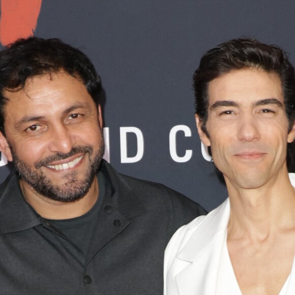 Jean-Rachid Kallouche (producteur) et Tahar Rahim lors de l'avant-première du film "Monsieur Aznavour" au cinéma Le Grand Rex à Paris le 22 octobre 2024. © Coadic Guirec / Bestimage