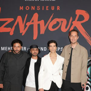 Jean-Rachid Kallouche (producteur), Mehdi Idir (réalisateur), Tahar Rahim, Grand Corps Malade ( GCM, Fabien Marsaud) et Katia Aznavour (fille de C.Aznavour) lors de l'avant-première du film "Monsieur Aznavour" au cinéma Le Grand Rex à Paris le 22 octobre 2024. © Coadic Guirec / Bestimage