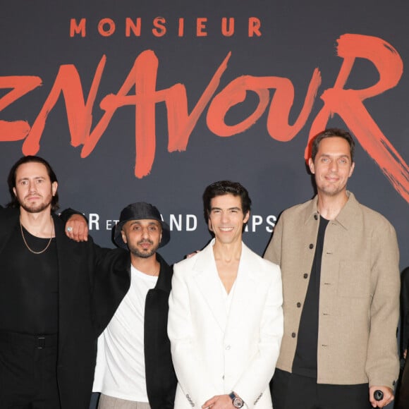 Jean-Rachid Kallouche (producteur), Bastien Bouillon, Mehdi Idir (réalisateur), Tahar Rahim, Grand Corps Malade ( GCM, Fabien Marsaud) et Marie-Julie Baup lors de l'avant-première du film "Monsieur Aznavour" au cinéma Le Grand Rex à Paris le 22 octobre 2024. © Coadic Guirec / Bestimage