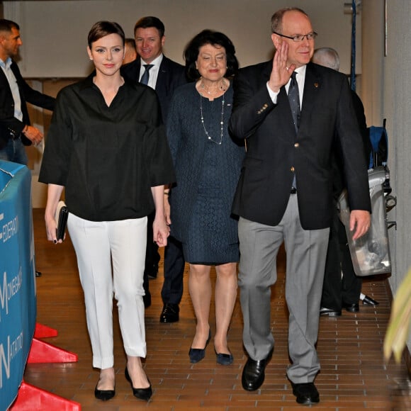 Exclusif - La princesse Charlene de Monaco, son frère Gareth Wittstock, Mme Yvette Lambin-Berti, secrétaire général du Comité Olympique Monégasque, et le prince Albert II de Monaco durant le 40eme Meeting International Natation de Monte-Carlo à la piscine du stade Louis II de Monaco, le 21 mai 2023 © Bruno Bebert/Bestimage