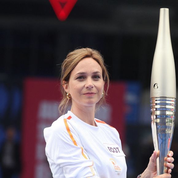 Nathalie Péchalat et la flamme olympique