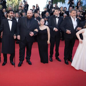 President of the International Cannes Film Festival Iris Knobloch, Céline Groussard, Artus, Clovis Cornillac and the cast of 'Un p'tit truc en plus' attending the "Le Comte De Monte-Cristo" Red Carpet at the 77th annual Cannes Film Festival at Palais des Festivals on May 22, 2024 in Cannes, France.