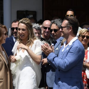 David Hallyday, Nathalie Baye - Mariage de Laura Smet et Raphaël Lancrey-Javal à l'église Notre-Dame des Flots au Cap-Ferret le jour de l'anniversaire de son père Johnny Hallyday le 15 juin 2019.