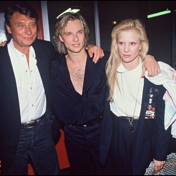 Archives - David Hallyday - le soir de la première en 1991 avec son père Johnny Hallyday et sa mère Sylvie Vartan.