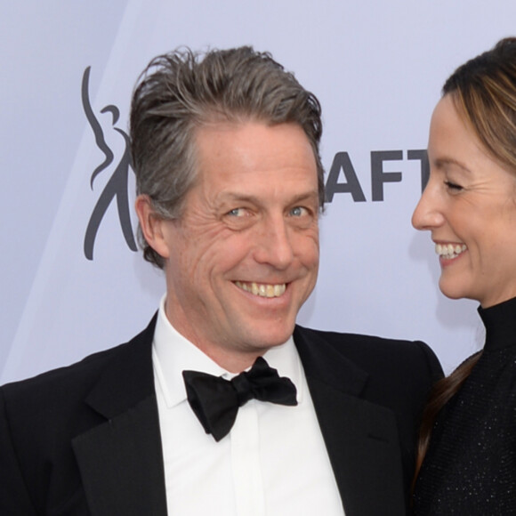 Hugh Grant et sa femme Anna Elisabeth Eberstein - Photocall - 25ème cérémonie annuelle des Screen Actors Guild Awards au Shrine Audritorium à Los Angeles, le 27 janvier 2019.