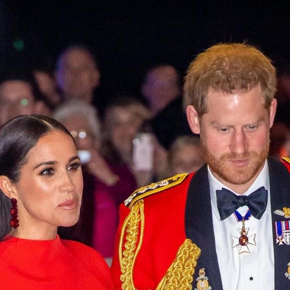 "J'en ai tellement marre d'eux en général, ils monopolisent tous les jours les gros titres", ajoute un autre
 
Meghan Markle et le prince Harry à Londres.