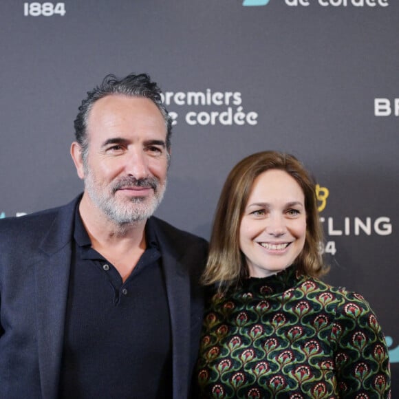 Jean Dujardin et sa femme Nathalie Péchalat (nouvelle présidente de l'association "Premiers de Cordée") - Dîner de charité Breitling à la Samaritaine pour l'association "Premiers de Cordée" à Paris le 4 avril 2024. © Rachid Bellak/Bestimage 