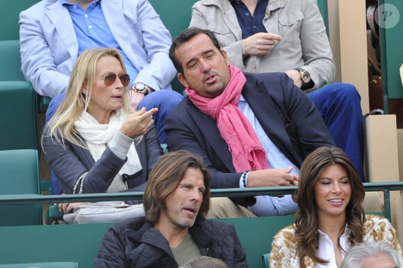 Estelle Lefebure et son compagnon Pascal Ramette regardent Stanislas Wawrinka affronter Roger Federer lors de leur dernier match au Monte-Carlo Rolex Masters de tennis, à Monaco, le 20 avril 2014. Photo par Corinne Dubreuil/ABACAPRESS.COM