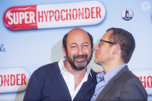 Kad Merad et Dany Boon lors du photocall du film " Supercondriaque " à Berlin, le 31 mars 2014.