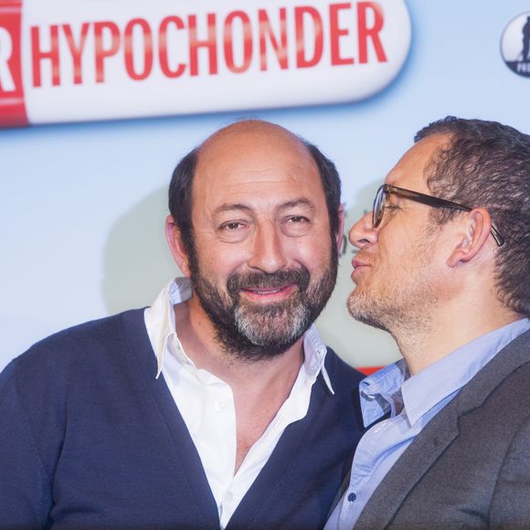 Kad Merad et Dany Boon lors du photocall du film " Supercondriaque " à Berlin, le 31 mars 2014.