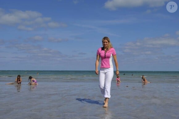 Kim Clijsters revient dans le Top 10 à la faveur de sa victoire à Key Biscane, Miami, le 3 avril 2010. Un triomphe sous les yeux de sa petite Jada, dans les bras de sa mamie !
