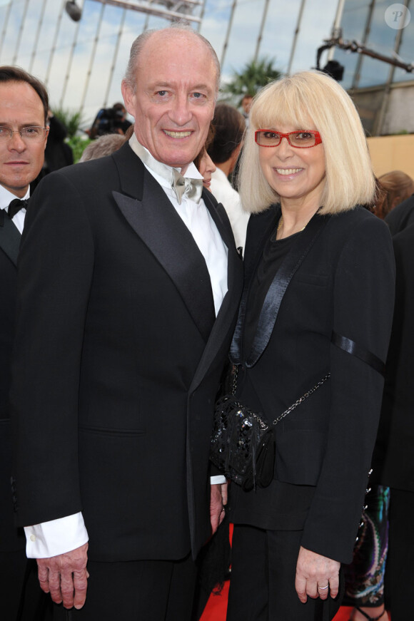 Mireille Darc et son mari Pascal Desprez lors de l'ouverture du festival de Cannes le 12 mai 2010