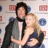 Ron Moss et Adrienne Frantz sont là pour recevoir le prix de la série la plus populaire pour Amour, Gloire et Beauté (18 mai 2010 à Los Angeles)