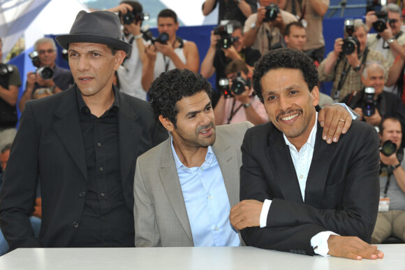 Roschdy Zem, Jamel Debbouze et Sami Bouajila lors du photocall du film Hors-la-loi le 21 mai 2010 durant  le festival de Cannes