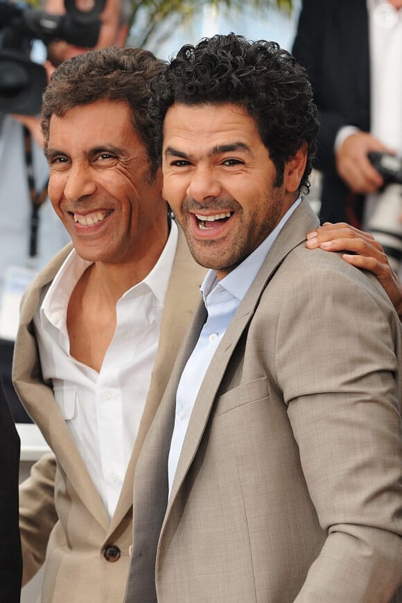 Rachid Bouchareb et Jamel Debbouze lors du photocall du film Hors-la-loi le 21 mai 2010 durant le festival de Cannes
