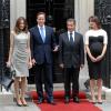 Carla Bruni, David Cameron, Nicolas Sarkozy et Sarah Cameron lors de la commémoration de l'Appel du 18 juin 1940 à Londres, le 18 juin 2010