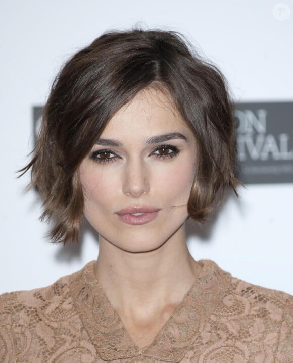 Keira Knightley pose pour le photocall de Never let me go, au Vue Cinema, à Londres, le 13 octobre 2010
