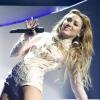Miley Cyrus adore faire l'acrobate aux MTV Europe music awards à Madrid le 7 novembre 2010.
