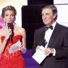 Sylvie Tellier et Jean-Pierre Foucault sont les maîtres de cérémonie de la soirée Miss France 2011. Alain Delon est le président du jury. 