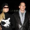 Paris Hilton sort d'un restaurant avec son petit ami Cy Waits, mardi 11 janvier à Los Angeles.