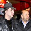 Nicolas Cage arrivant à l'aéroport d'Istanbul en Turquie le 12 janvier 2011, avec sa femme Alice Kim et leur fils Kal-El