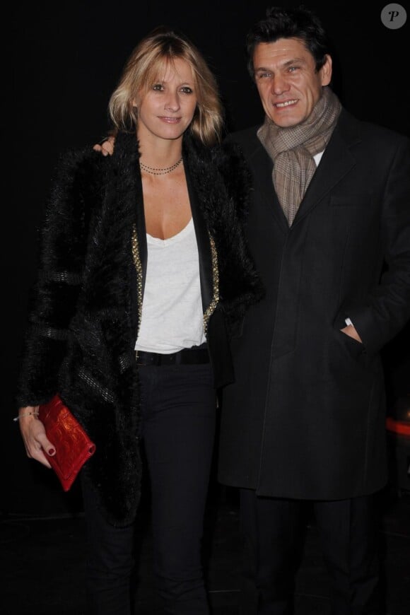 Sarah et Marc Lavoine lors du défilé Etam le 24 janvier 2011 à Paris, au Grand Palais