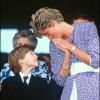 Le Prince William d'Angleterre toujours aussi complice avec sa maman la Princesse Lady Di à Wimbledon en juillet 1991