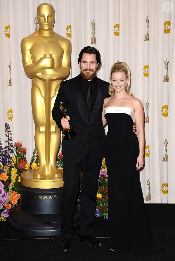 Christian Bale (Oscar du meilleur second rôle pour Fighter) avec Reese Witherspoon, lors de la cérémonie des Oscars le 27 février 2011 à Los Angeles