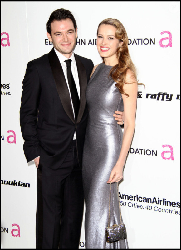 Petra Nemcova et son fiancé Jamie Belman à la 19ème édition de la Elton John AIDS Foundation organisé à Los Angeles, le 27 février 2011.