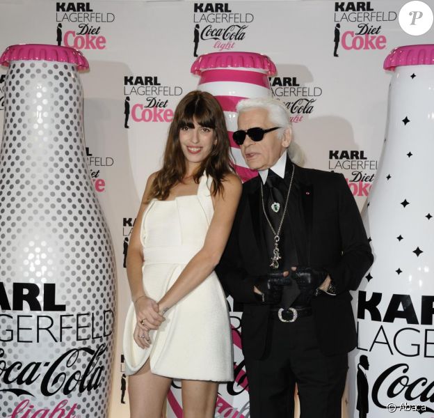 Lou Doillon et Karl Lagerfed lors de la soirée Coca Cola Light pour célébrer le lancement de la bouteille imaginée par Karl Lagerfeld. Le 7 avril 2011