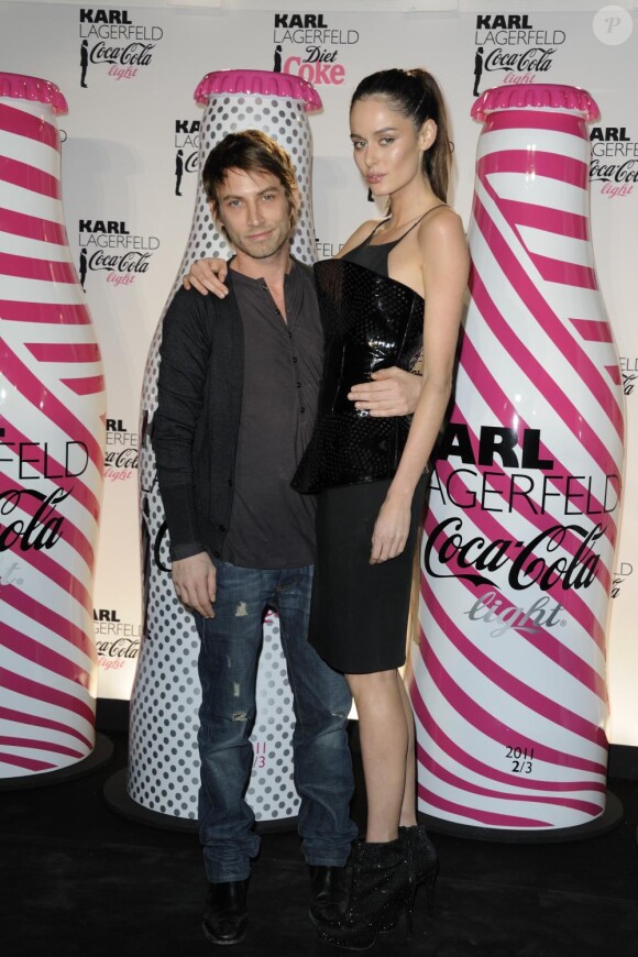 Ora-ïto et Nicole Trunfio lors de la soirée Coca Cola Light pour célébrer le lancement de la bouteille imaginée par Karl Lagerfeld. Le 7 avril 2011