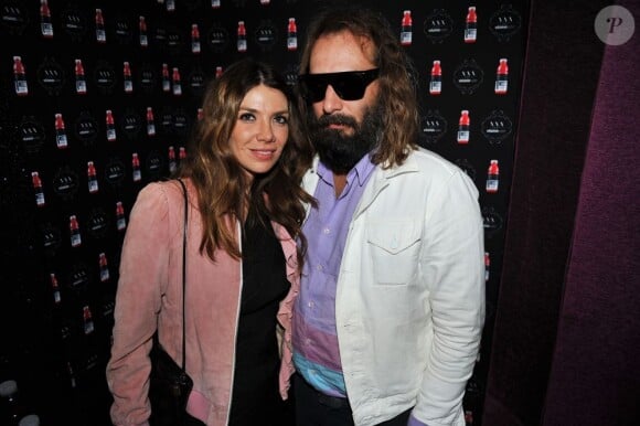 Sébastien Tellier et une amie lors de la soirée Vitamin Water aux Chandelles pour le lancement de son nouveau parfum XXX-3 baies le mardi 19 avril 2011