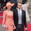 Victoria de Suède et son époux Daniel Westling arrivant à l'Abbaye de Westminster pour assister au mariage de Kate Middleton avec le Prince William, le 29 avril 2011
